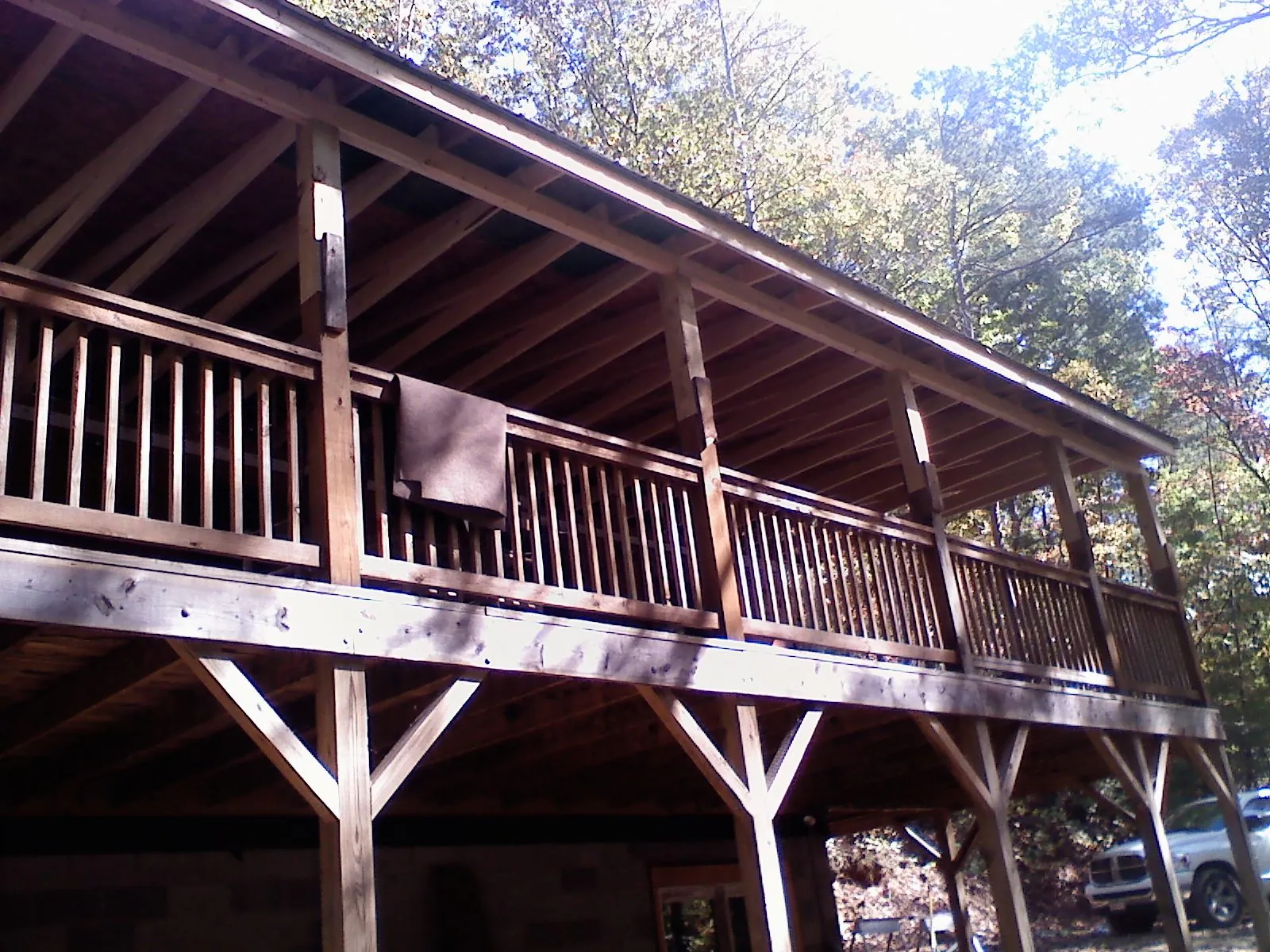 Timber framing under a new elevated porch and deck — Roof Leak Repair in Colton by Roofing Brothers